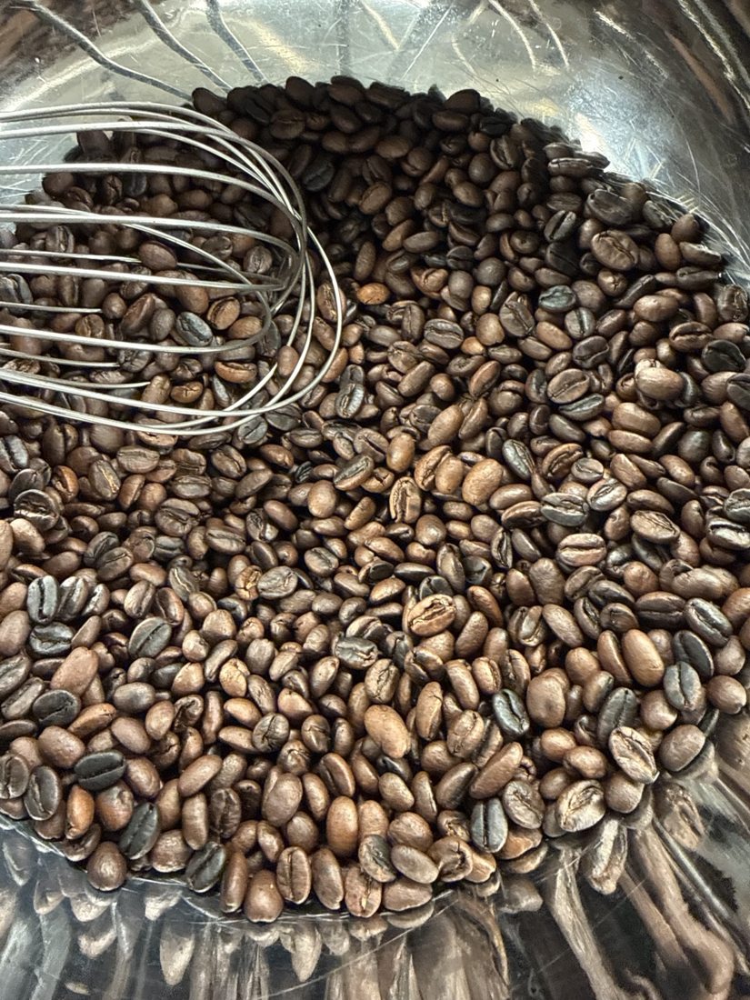Roasted coffee beans in a bowl